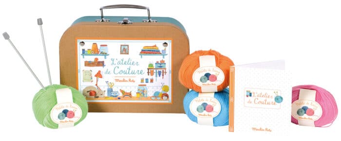 Suitcase containing haberdashery, pictured with balls of wool and knitting needles - Moulin Roty 710 404