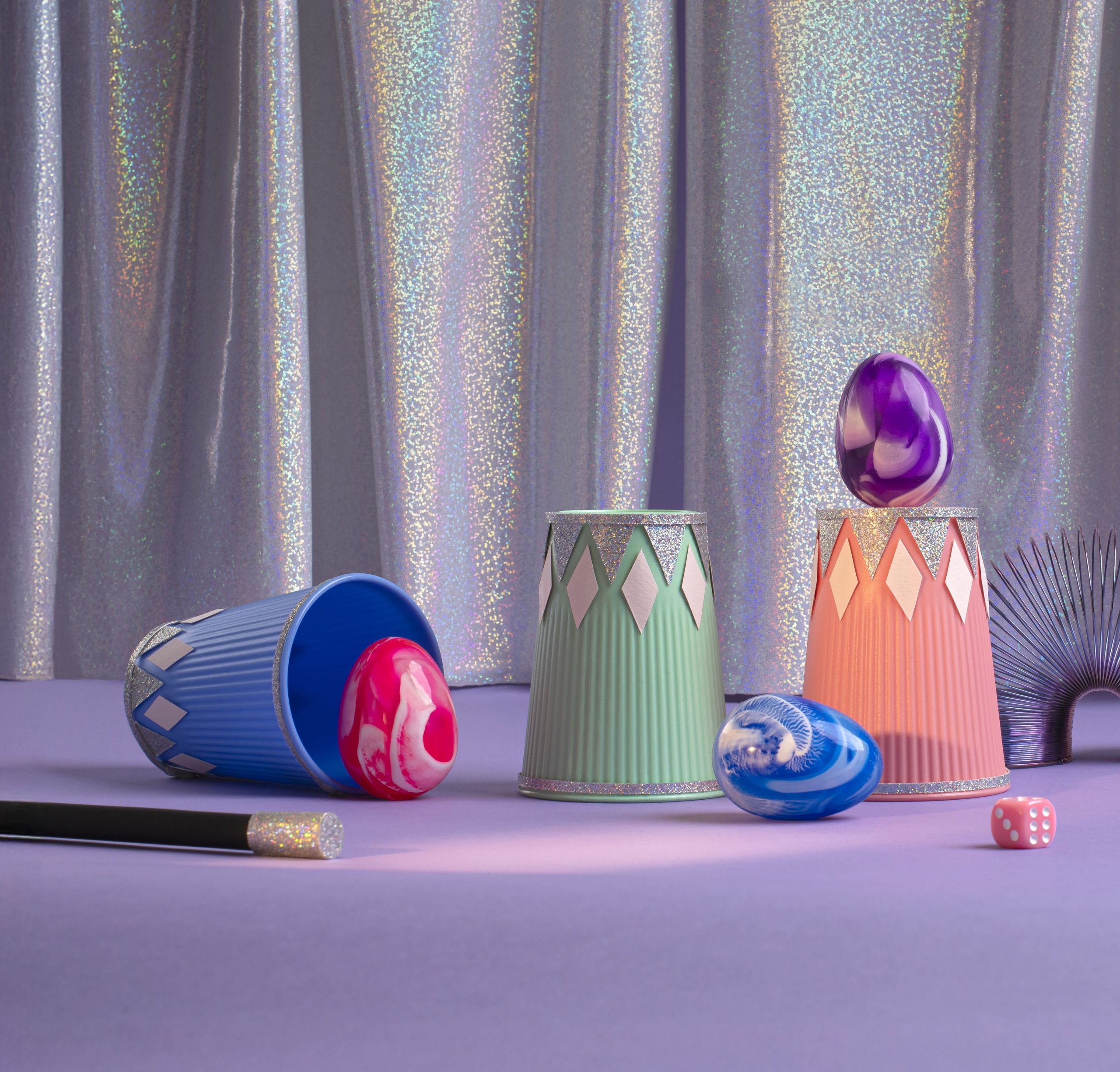 cups and coloured balls