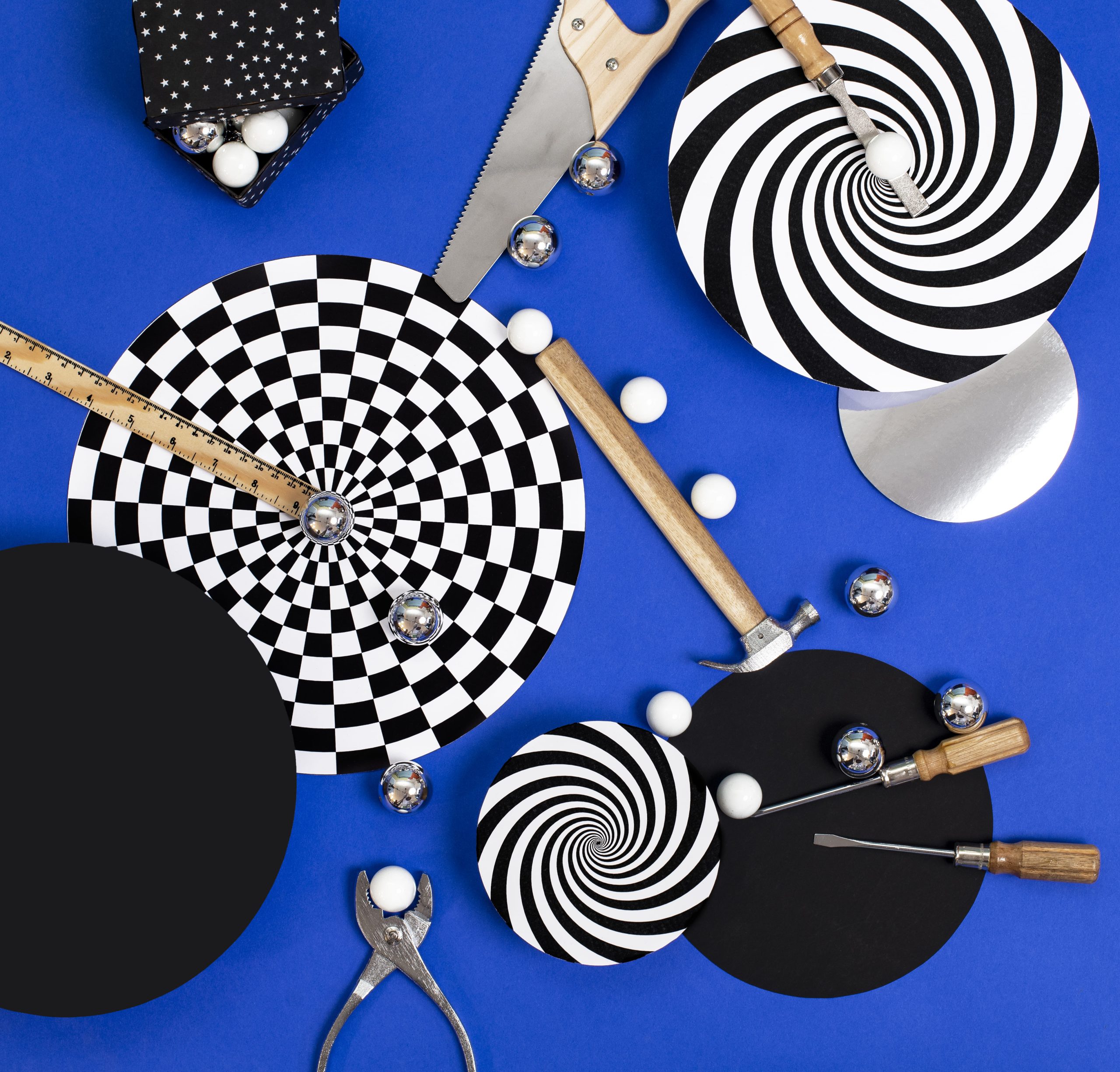 spiral cards with visual illusions in black and white